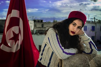 Woman Wearing White And Purple Long-sleeved Top Beside Turkey Flag
