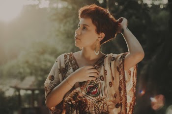 Woman Wearing White and Red Floral Deep V-neck Top