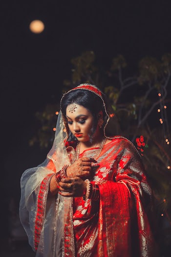 Woman Wearing White and Red Floral Saree Dress