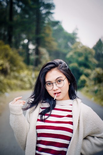 Woman Wearing White and Red Striped Top