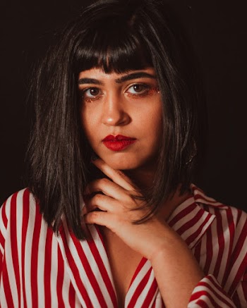 Woman Wearing White and Red Striped Top