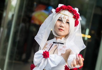Woman Wearing White and Red Sweetheart Neckline Dress