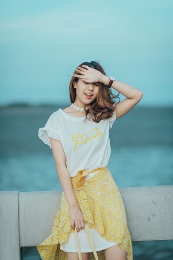 Woman Wearing White and Yellow Scoop-neck Mini Dress