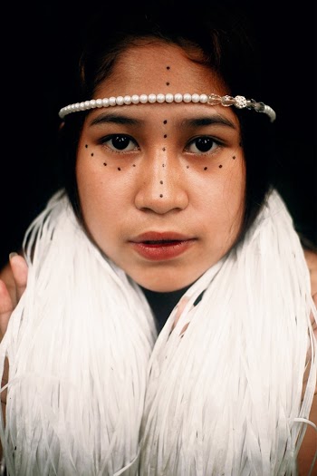 Woman Wearing White Beaded Head Accessory