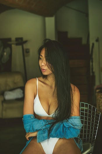 Woman Wearing White Bikini and Blue Denim Jacket