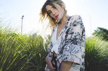 Woman Wearing White, Black, and Gray Floral Print Cardigan