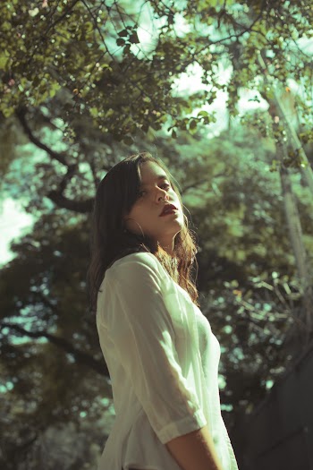 Woman Wearing White Blouse