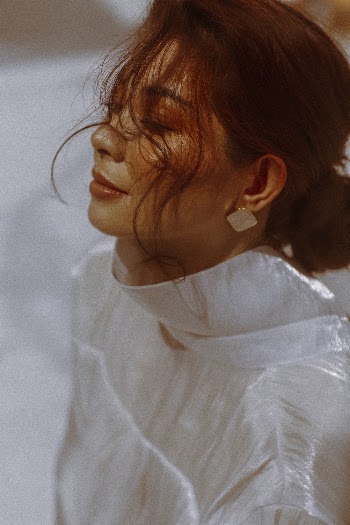 Woman Wearing White Blouse