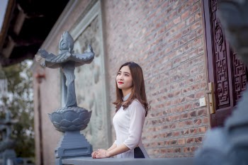 Woman Wearing White Blouse Looking at Sky