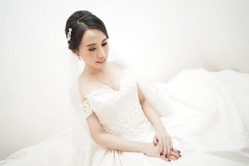 Woman Wearing White Bridal Gown
