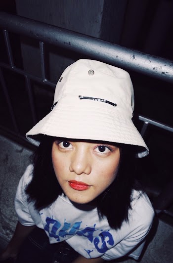 Woman Wearing White Bucket Hat