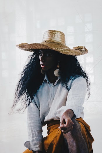 Woman Wearing White Button-up Long Sleeved Shirt