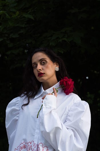 Woman Wearing White Button Up Shirt