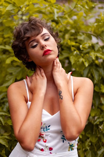 Woman Wearing White Camisole