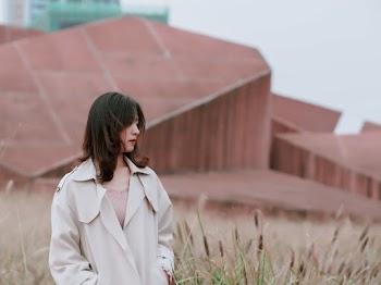 Woman Wearing White Coat