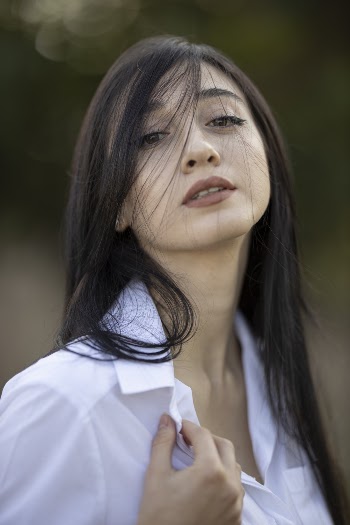 Woman Wearing White Collared Shirt