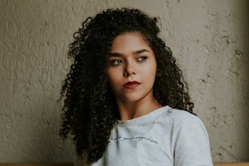 Woman Wearing White Crew-neck Shirt
