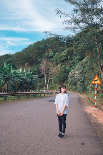 Woman Wearing White Crew-neck Shirt