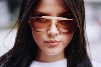 Woman Wearing White Crew-neck Shirt and Sunglasses