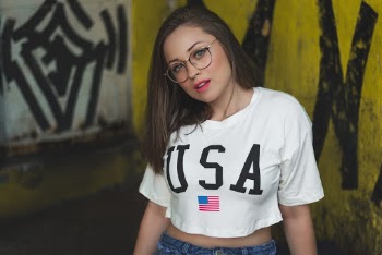 Woman Wearing White Crop-top Near Wall