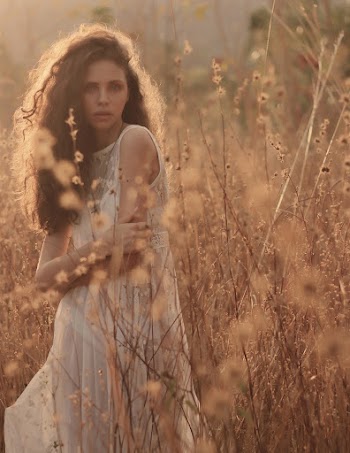 Woman Wearing White Dress Standing Standing on Field