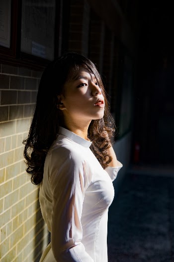 Woman Wearing White Dress Top