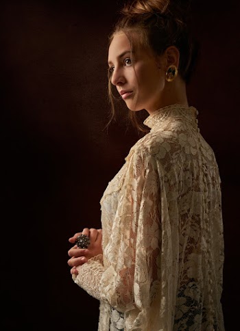 Woman Wearing White Floral Long-sleeved Top