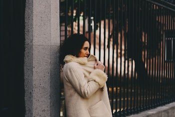 Woman Wearing White Fur Coat