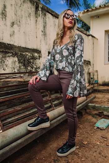 Woman Wearing White, Green, and Gray Floral Long-sleeved Top and Gray Pants