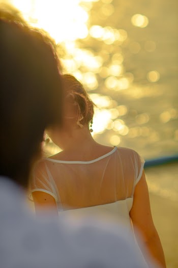 Woman Wearing White Illusion-neckline Dress