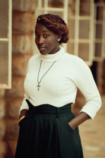 Woman Wearing White Knit Sweater and Black Skirt