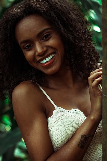 Woman Wearing White Knit Top 