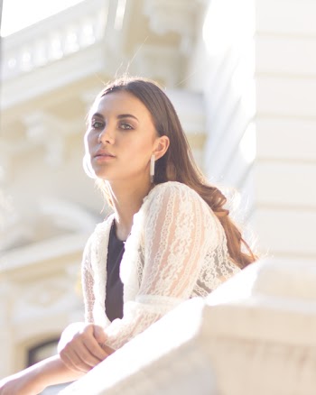 Woman Wearing White Lace Top