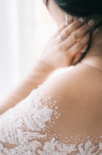 Woman Wearing White Lace Top