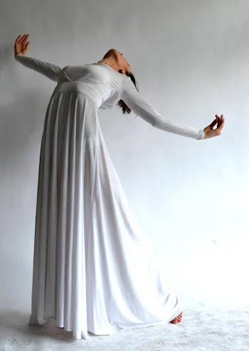 Woman Wearing White Long-sleeve Dress