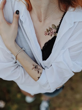 Woman Wearing White Long Sleeved Blouse