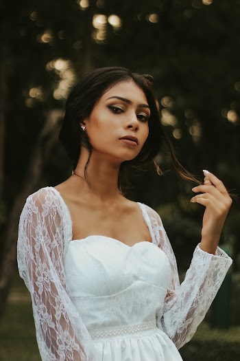 Woman Wearing White Long-sleeved Dress