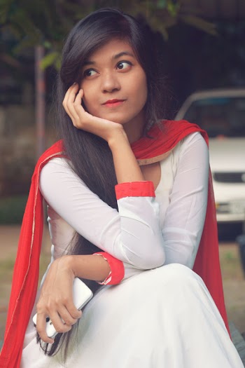 Woman Wearing White Long-sleeved Dress And Red Scarf