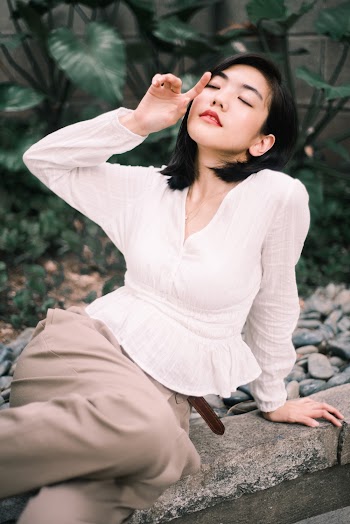 Woman Wearing White Long-sleeved Shirt
