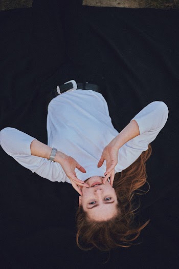 Woman Wearing White Long Sleeves Shirt