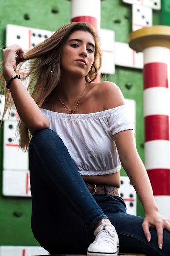 Woman Wearing White Off-shoulder Crop Top