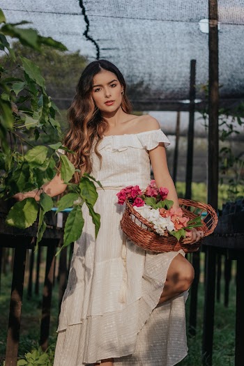 Woman Wearing White Off-Shoulder Dress