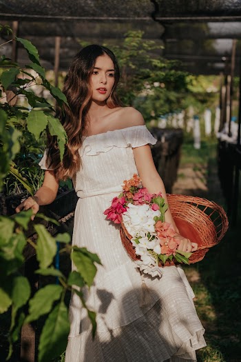 Woman Wearing White Off-Shoulder Dress