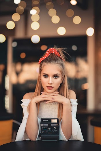 Woman Wearing White Off-Shoulder Top