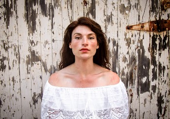 Woman Wearing White Off-shoulder Top