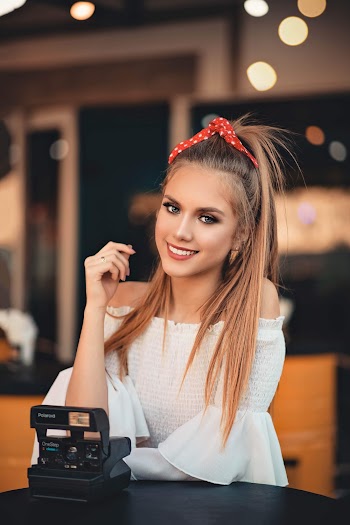 Woman Wearing White Off-Shoulder Top
