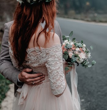 Woman Wearing White Off-shoulder Wedding Dress Beside Man Wearing Gray Shirt