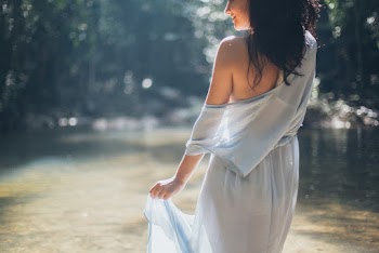 Woman Wearing White One-Shoulder Dress