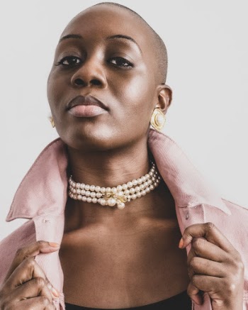 Woman Wearing White Pearl Beaded Necklace