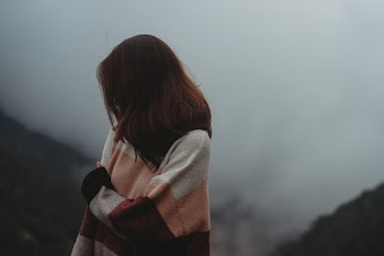 Woman Wearing White, Pink and Black Sweater